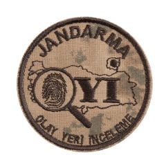 J. Kamuflaj Olay Yeri İnceleme Arma
